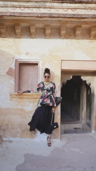 A black peplum crafted in beautiful pink and orange floral printed pure habutai silk chic trendy dress for party or special ocassions.