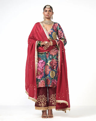Bottle green floral Deewani Choga Set crafted in crepe and dupion with hand embroidery and scattered sequin detailing, a designer kurta set ideal for wedding functions, festive celebrations, and party wear. Designed by Rishi and Vibhuti.