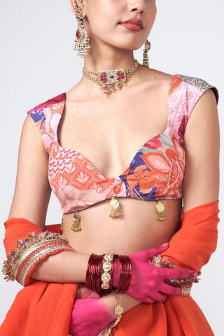 Detailed close-up of intricate hand embroidery on blouse luxurious crepe and organza fabric textures.