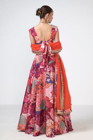 Back look of colorful lehenga ensemble highlighting blouse graceful silhouette and refined embroidered accents. 