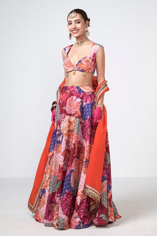 Elegant bohemian-inspired lehenga set with statement hand embroidery and coordinated festive styling.
