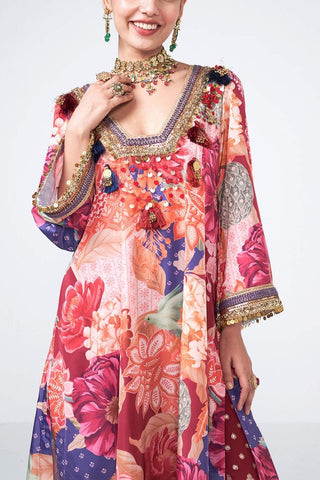 Close up of elegant Cherry Choga two-piece outfit featuring a cola crepe and georgette kurta paired with matching pants. Intricate appliqué work, scattered curve motifs, coin embellishments, and tassels create a refined contemporary ethnic ensemble.