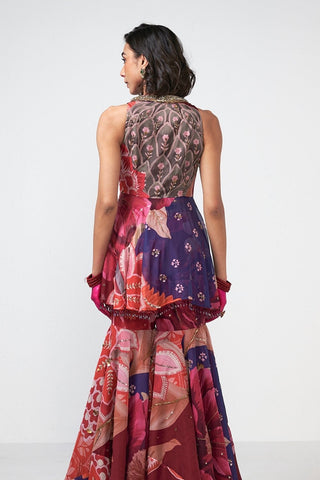 Back look of elegant crimson red coord set featuring subtle scattered coin work on fluid georgette lurex and crepe fabric for modern festive glamour.