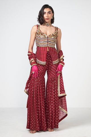Cherry Ghungroo Sharara Set in cola-toned dupion and georgette fabric featuring applique fringe detailing with a short kurta, sharara pants, and dupatta.