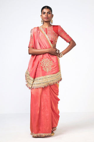 Coral Tales Saree crafted from premium tissue fabric featuring elegant appliqué trims and machine work, perfect for weddings, festive celebrations, and special occasions.
