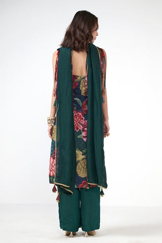 Back look of bottle green festive kurta set highlighting elegant silhouette and coordinated dupatta flow.