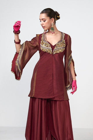 Designer Cherry Alkaline coord set with statement jacket, tube top, and pants adorned with intricate applique work, shimmering sequins, and playful tassel embellishments.
