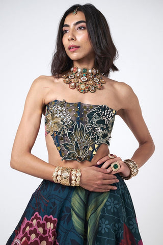 Detailed close-up of hand embroidery and shimmering scattered sequins on corset top crafted in crepe and organza fabric.
