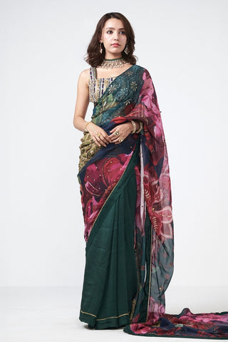 Elegant wrap saree outfit in organza and crepe fabric with modern drape silhouette and refined embroidery work. Perfect ensemble for festive occasion, wedding, parties, cocktail. The saree offers a graceful silhouette with contemporary appeal.