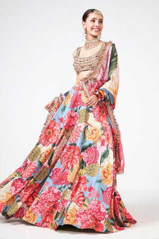 Luxury Gul Bagh lehenga from Rishi and Vibhuti showcasing detailed floral embroidery, premium craftsmanship, coordinated blouse, and elegant dupatta, offering timeless Indian designer fashion for weddings, sangeet, engagements, and festive occasions.