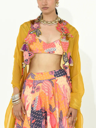 A model wearing raga vibrant three-piece lehenga set crafted in luxurious crepe and organza fabric. A perfect attire for brides to wear on wedding and ceremonies.