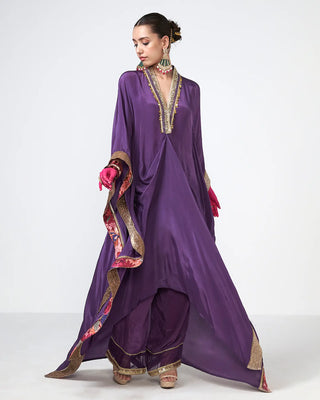 Full-length shot of the complete violet kaftan and pants ensemble.