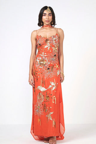 Narangi Mimi orange organza dress featuring exquisite hand embroidery and scattered sequin embellishments. This elegant designer dress offers a lightweight feel and graceful silhouette, making it an ideal choice for festive celebrations, wedding functions, parties, and special occasions.