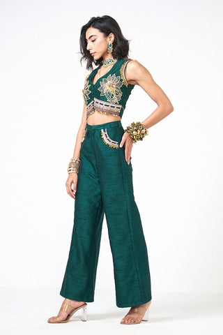 Luxury bottle green Dupion coord set featuring a hand-embroidered crop jacket paired with matching LL pants. Finished with scattered sequin embellishments, the Dusk Doom Emerald outfit is perfect for weddings, festive gatherings, and designer occasion wear.