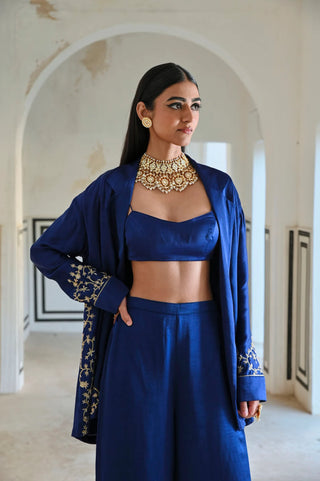 Royal blue loose-fitted embroidered blazer set paired with a bralet and palazzo, an Easestudio design for a modern, powerful festive silhouette.