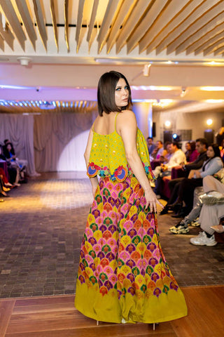 Side profile of a Australian Fashion Grandeur model in lime yellow Embroidered Co-Ord Set at Australian fashion runway. The flowy silhouette and rich hues ensure both comfort and a statement look.