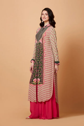 A sophisticated cream SB signature shirt dress showcasing running boota prints and a green floral centre panel, finished with a mandarin collar for a refined statement look.