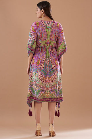 Back look of purple paisley kaftan featuring vibrant multicolor prints, a relaxed flowy silhouette.