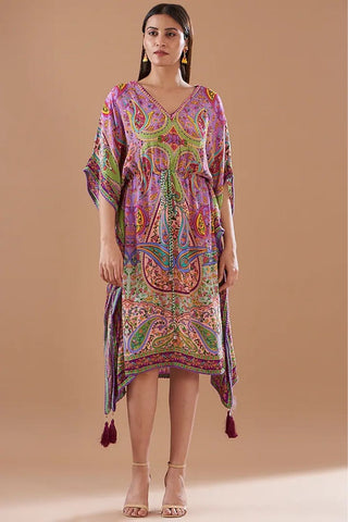 A purple paisley kaftan featuring vibrant multicolor prints, a relaxed flowy silhouette, and a comfortable loose fit, designed for casual and resort wear. Designed by Siddhartha Bansal.