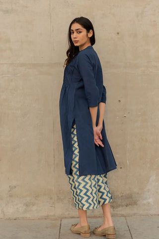 Vrajbhoomi indigo culotte pants featuring hand block printed detailing, paired with a coordinating pintuck kurta for a contemporary Indian outfit.