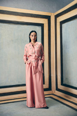 Women posing in a Dusky pink (Mauve) co-ord set featuring a delicate embroidered shirt, paired with pants and tie up belt offering a clean and elegant look perfect for effortless styling. Designed by Ease. 
Pefect dress for parties, formals, evening soiree, office, everyday, formal ceremonial events, casual, holiday vacation or for resort.